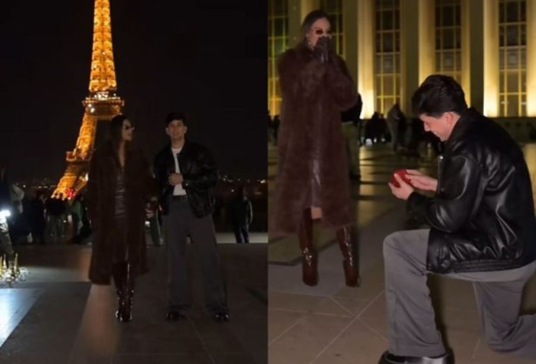 O cantor Léo Foguete ajoelhado em frente à Torre Eiffel, segurando uma caixinha de aliança para Ihandra Martins.